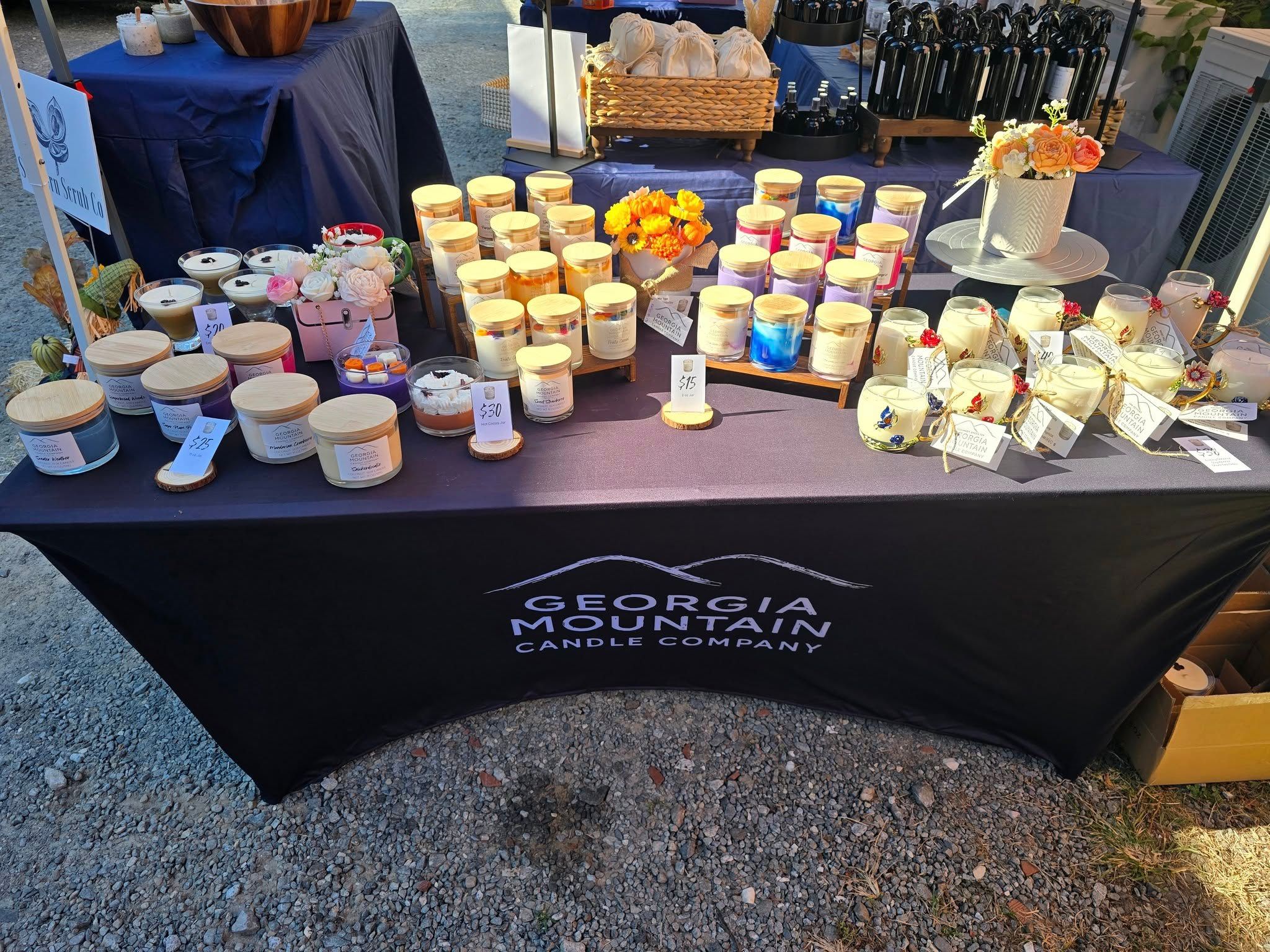 Handmade candles displayed at a local event